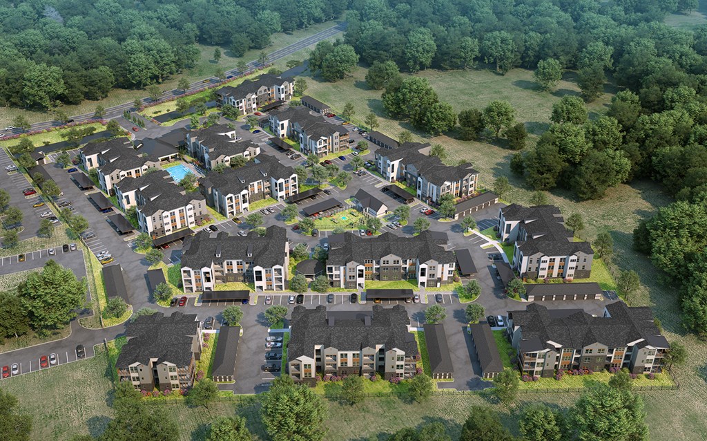 an aerial view of a neighborhood with houses and trees