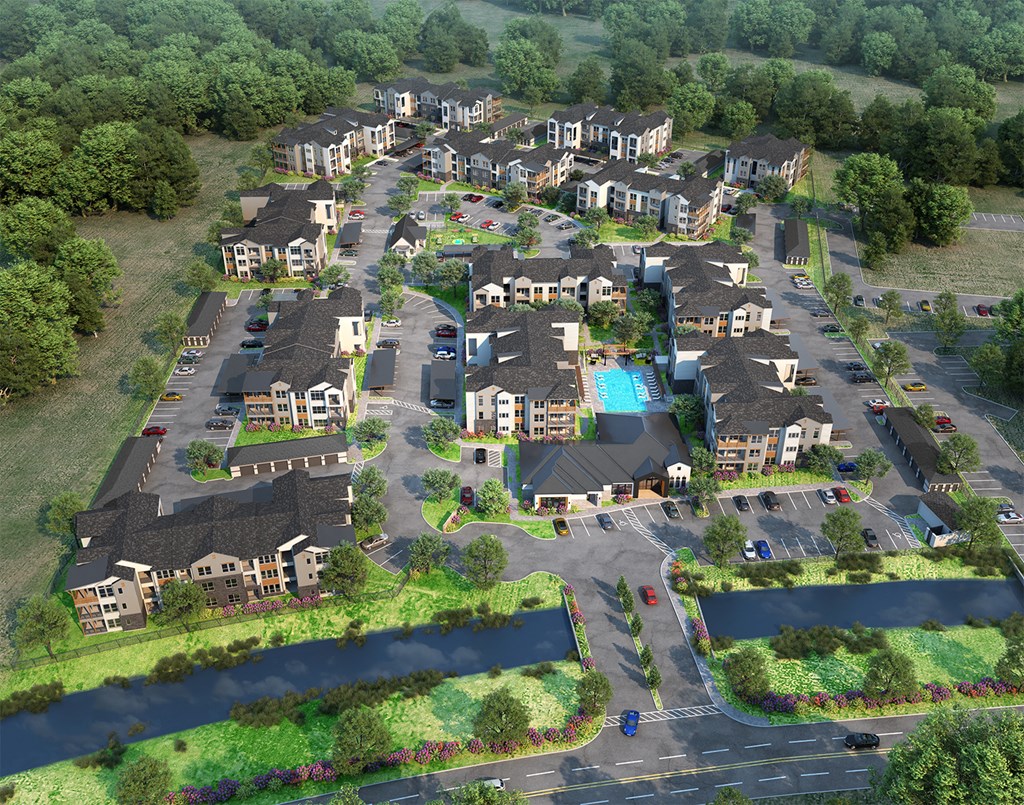 an aerial view of a neighborhood with houses and a swimming pool