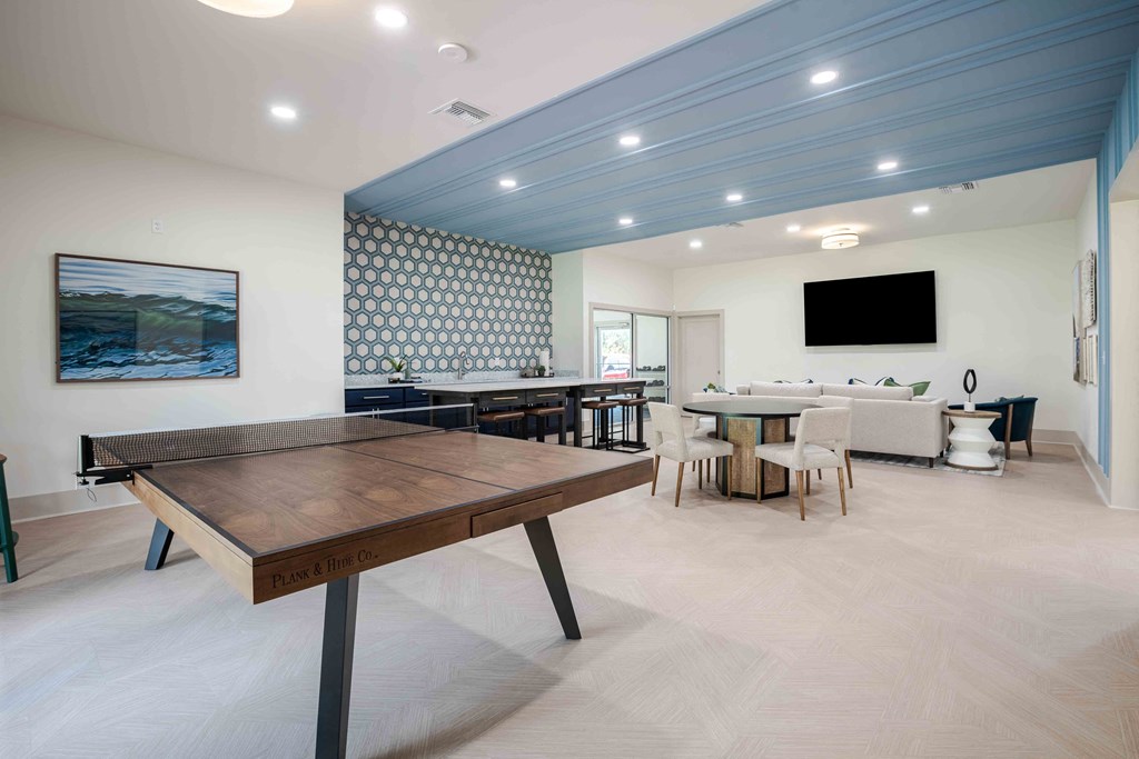 Clubhouse with a ping pong table at The Marley at Trout River in Jacksonville, Florida.