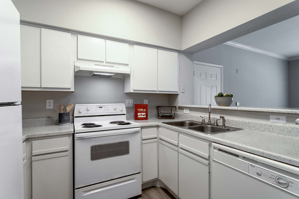 Affordable Houston Texas Apartments – Westchase Forest – Photo of kitchen with white cabinets