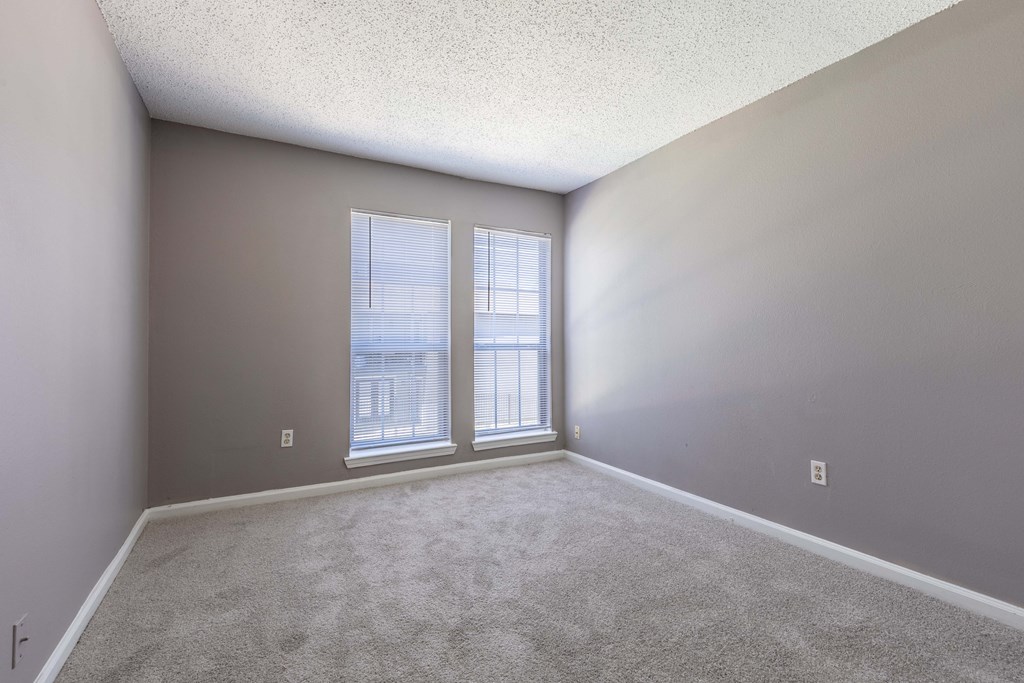 Westchase Apartments in Harvey LA photo of bedroom with large windows
