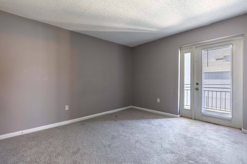 Westchase Apartments in Harvey LA photo of living room with plush carpeting