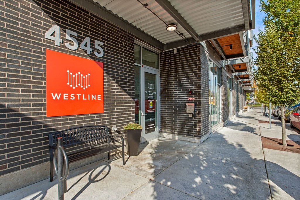 A Westline sign is on a brick building.