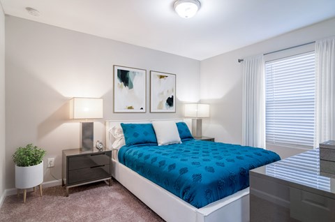 Living room with large window and natural light at Westwood Glen apartment community in Atlanta GA