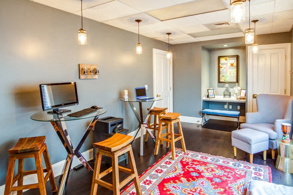 business center with computers and lounge area