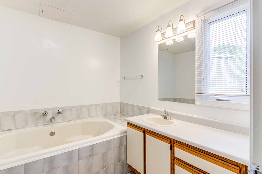 bathroom with large soaking tub