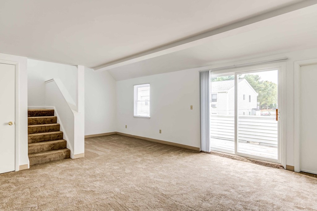 townhome apartment with large living area and staircase