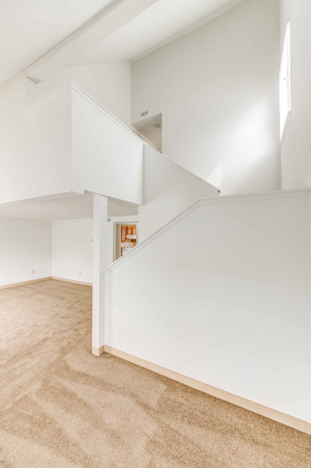 townhome apartment with large living area and staircase