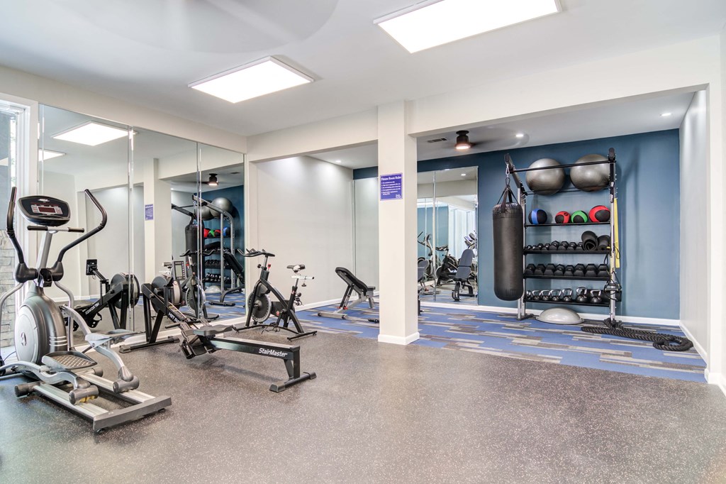 Fully equipped fitness center with cardio machines and weight training equipment at Wyndcliff Galleria in Smyrna, GA.