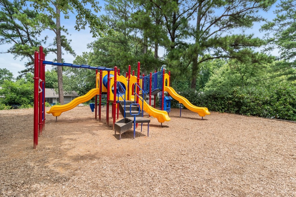 Community playground with slides and climbing structures at Wyndcliff Galleria in Smyrna, GA