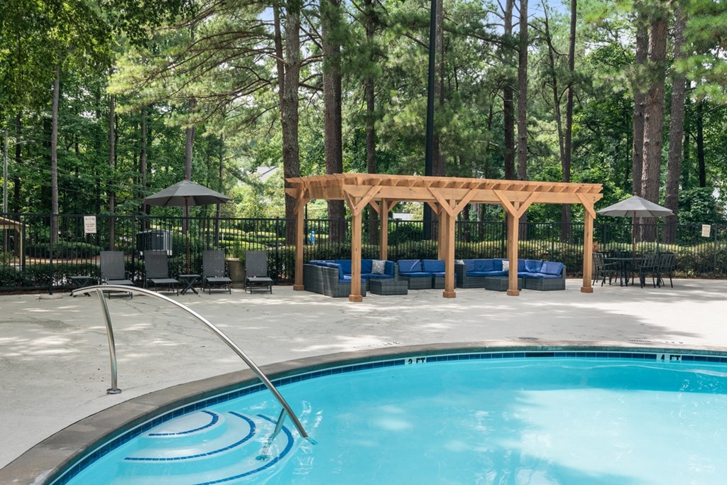 Resort-style pool with surrounding lounge seating at Wyndcliff Galleria in Smyrna, GA.