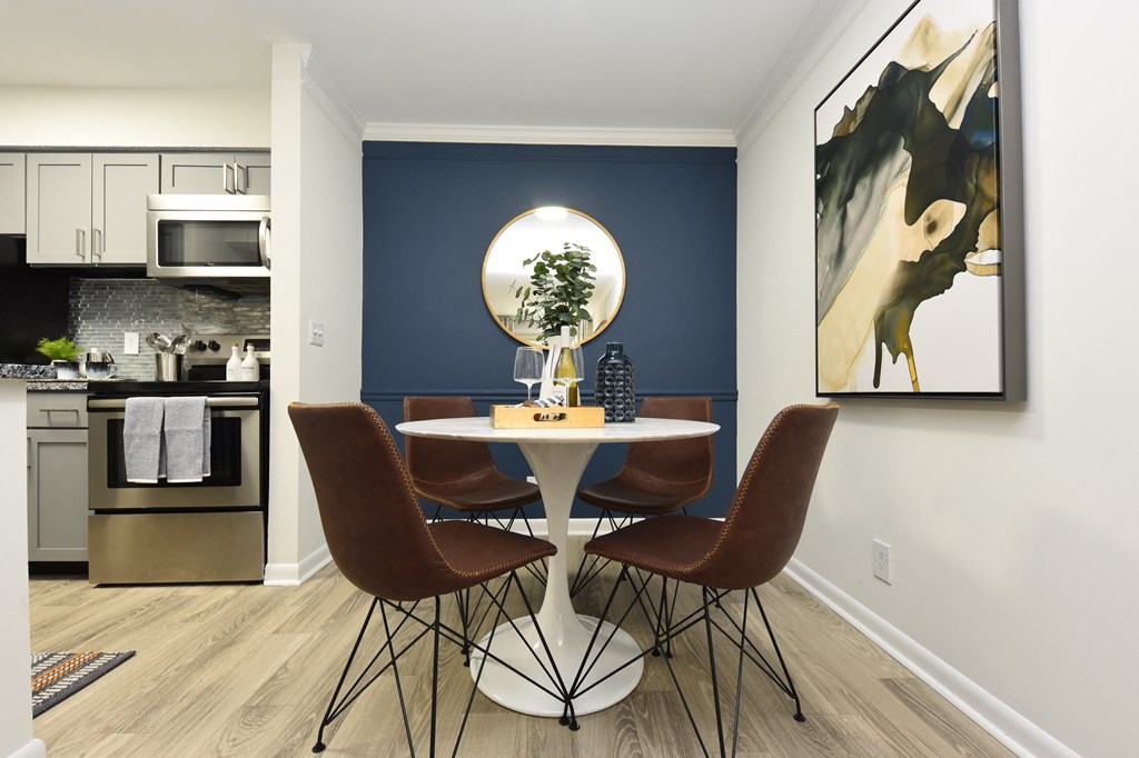 Luxury Nashville apartment dining room with wood-style flooring
