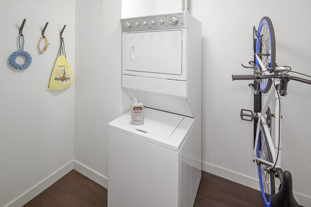 a small laundry room with a washer and dryer
