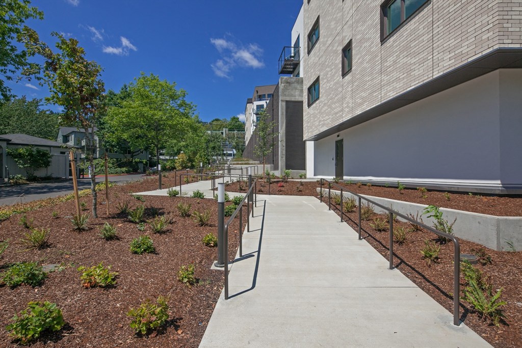 a view of the walkway in front of the building