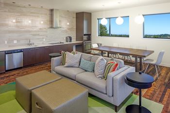 a living room with a couch and a table