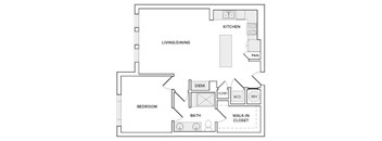 A floor plan of a home showing a living area, a kitchen, a bedroom, a bathroom, a desk, and a walk-in closet.