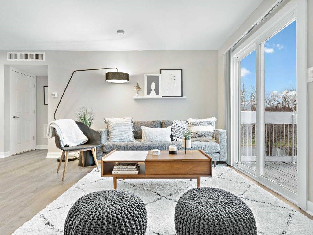 a living room with a couch and a table