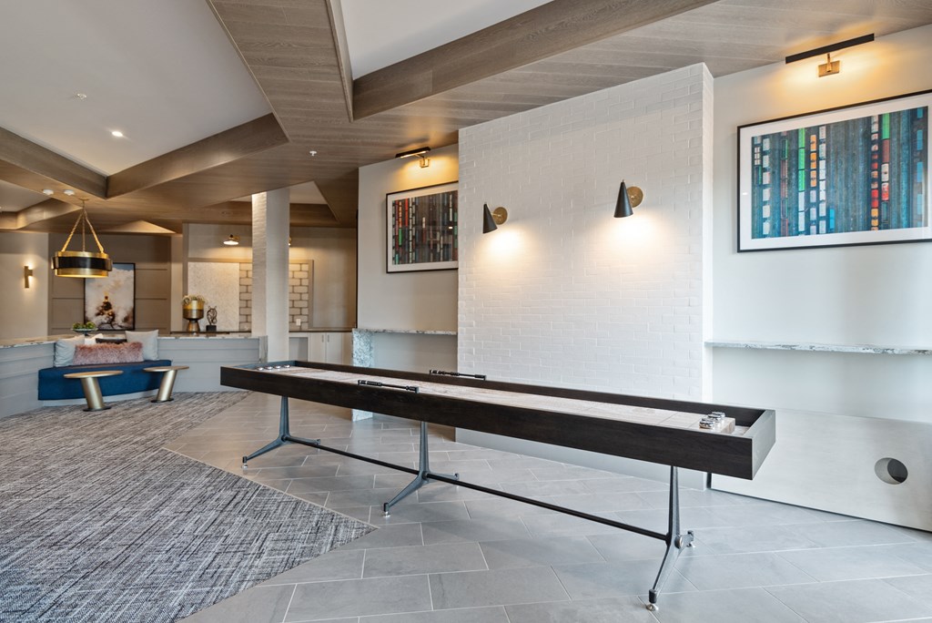 a ping pong table in the lobby of a building