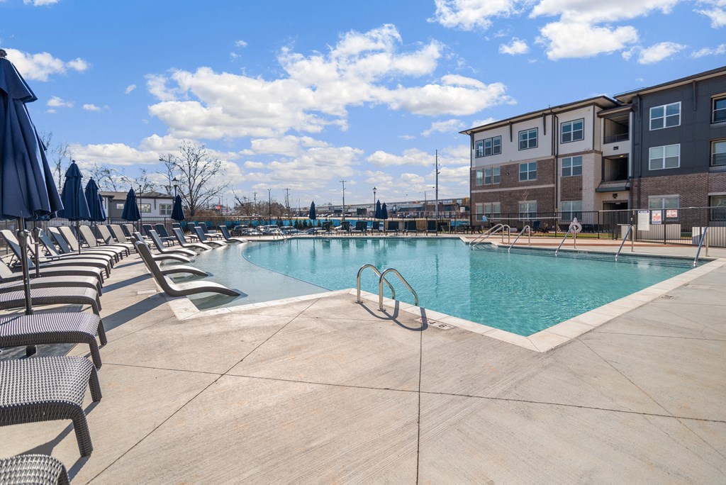 our apartments have a large pool and lounge chairs