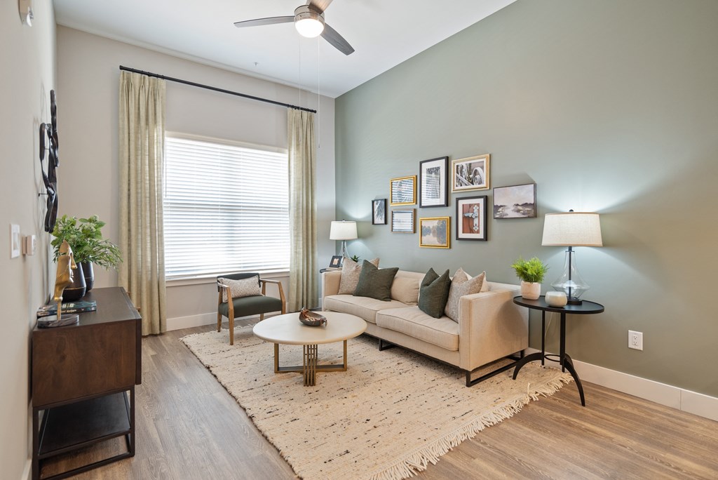 a living room with a couch and a table