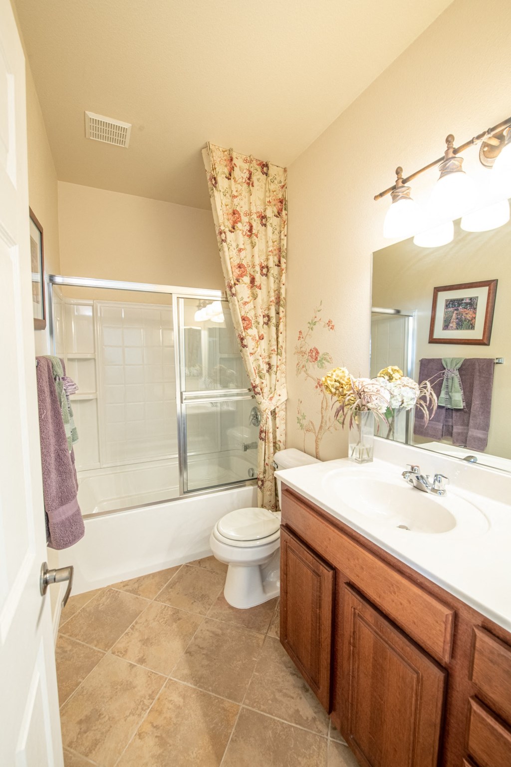 a bathroom with a sink toilet and a shower