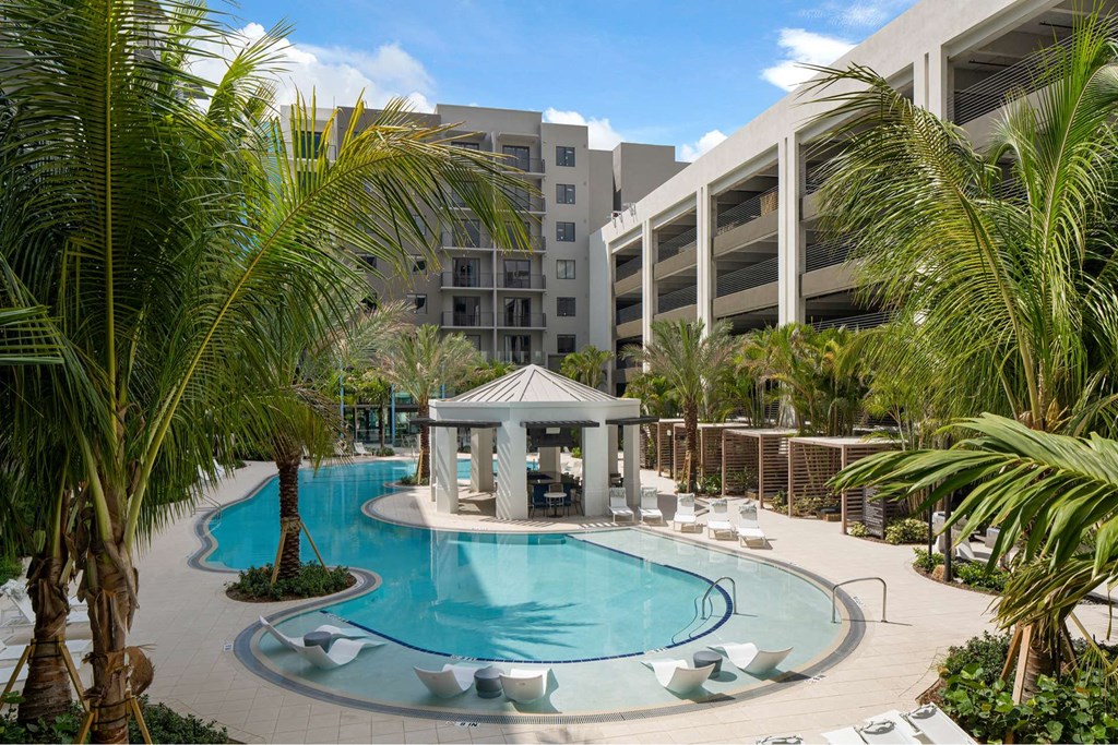 Luxury Boca Raton Apartments – CERU - Resort style pool with a gazebo and palm trees