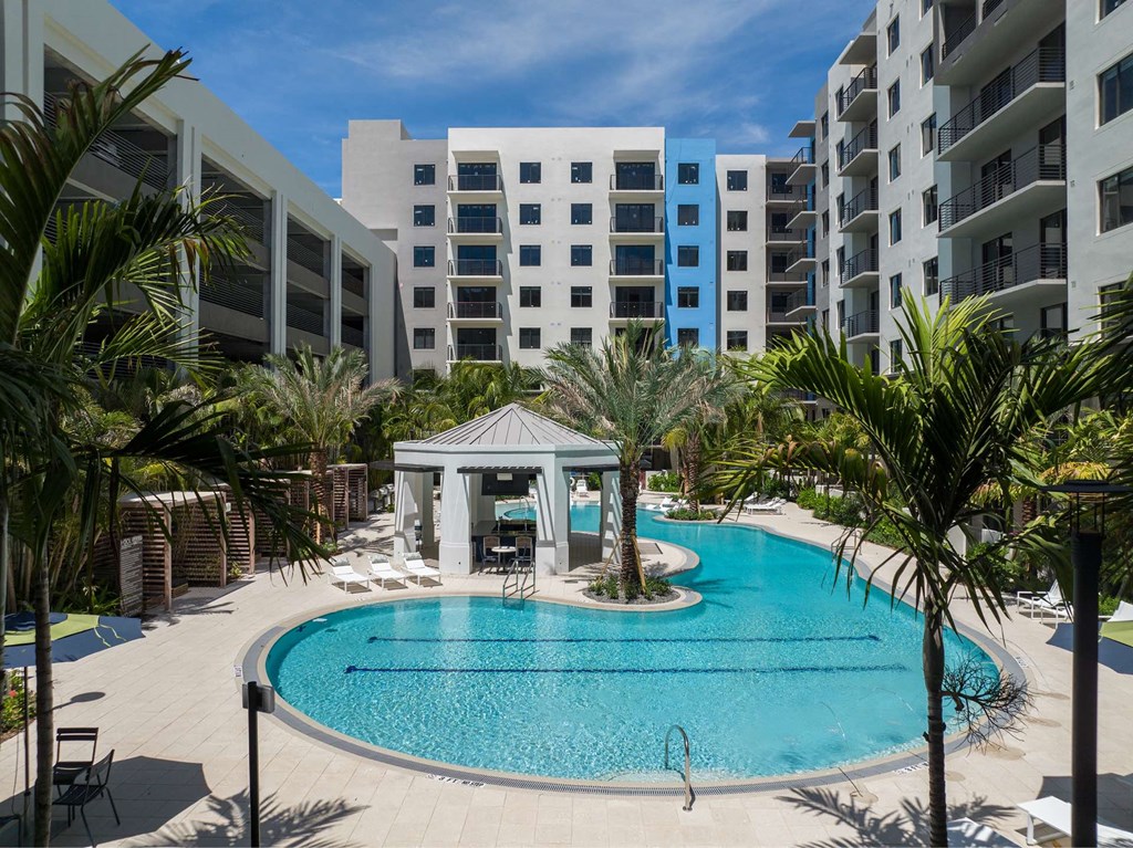 Luxury Boca Raton Apartments – CERU - a large swimming pool in front of our community building