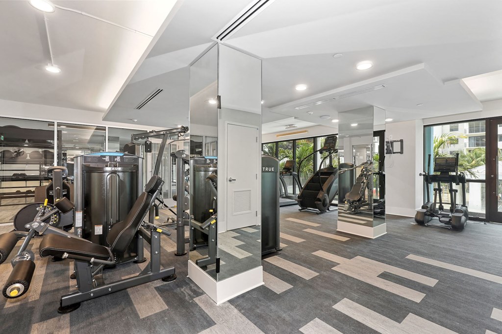 Apartments in Boca Raton for Rent – CERU - a gym with cardio equipment and weights