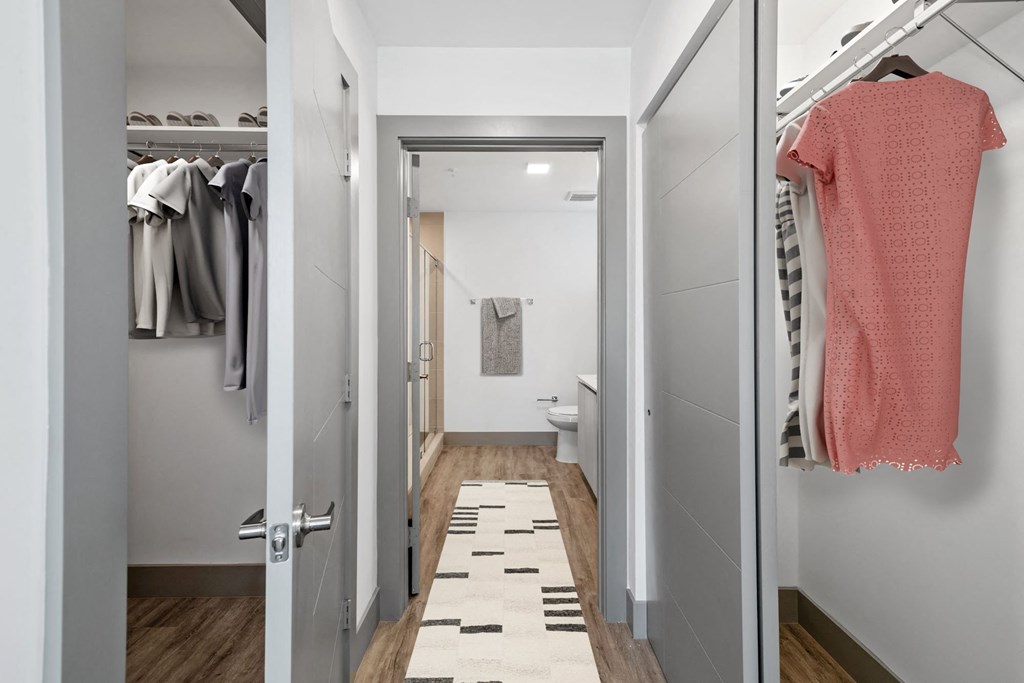 Luxury Boca Raton Apartments – CERU - a walk in closet with shelving