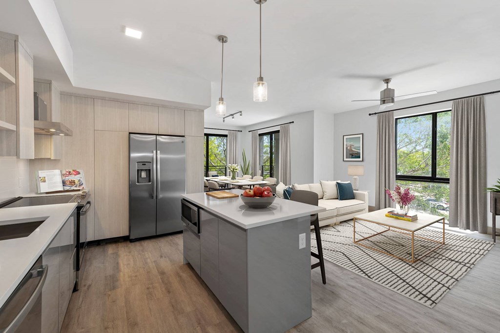 Pet-Friendly Apartments in Boca Raton, FL – CERU -  a kitchen with a center island and a living room