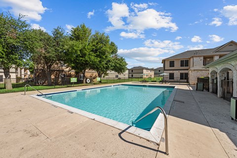 Resort-style swimming pool at Huntington Meadows Apartments in East Austin, Austin, TX 78724.