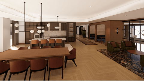 A modern dining room with a long table and chairs.