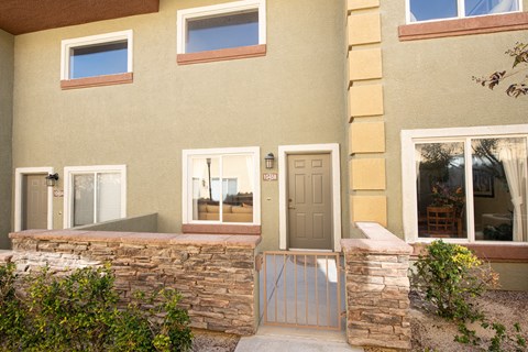 a view of the front door of an apartment building