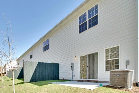 Harris Trail Luxury Townhomes for rent Richmond Hill, GA photo of back yard area of townhome