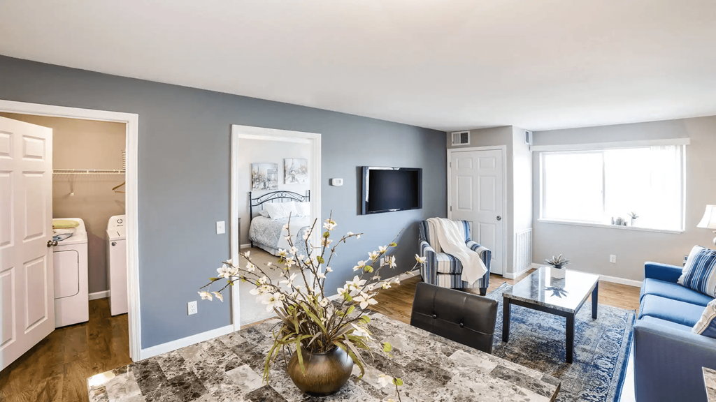 a living room with a couch and a tv