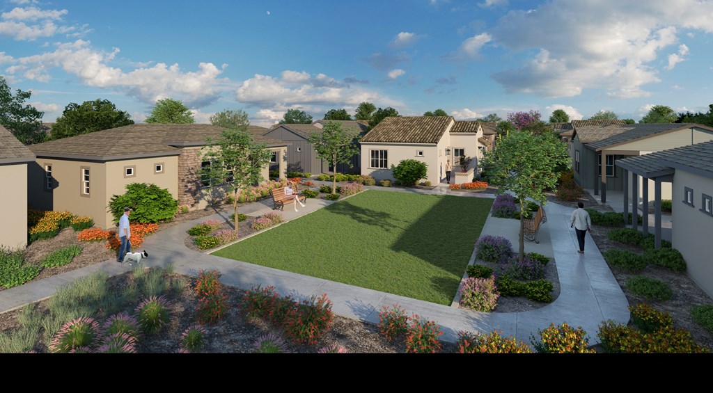 a rendering of a community with houses and a lawn