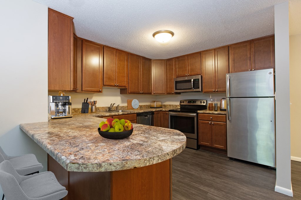 Laurel West End Apartments in Golden Valley, MN photo of kitchen with hardwood floors and stainless steel appliances