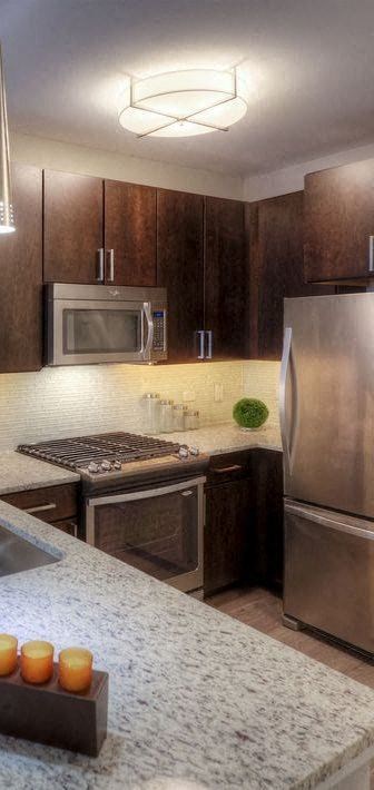 Apartments in Alameda-Rica Vista Modern Kitchen with Modern Cabinetry and Matching Stainless Steel Appliances - Photo Gallery 5
