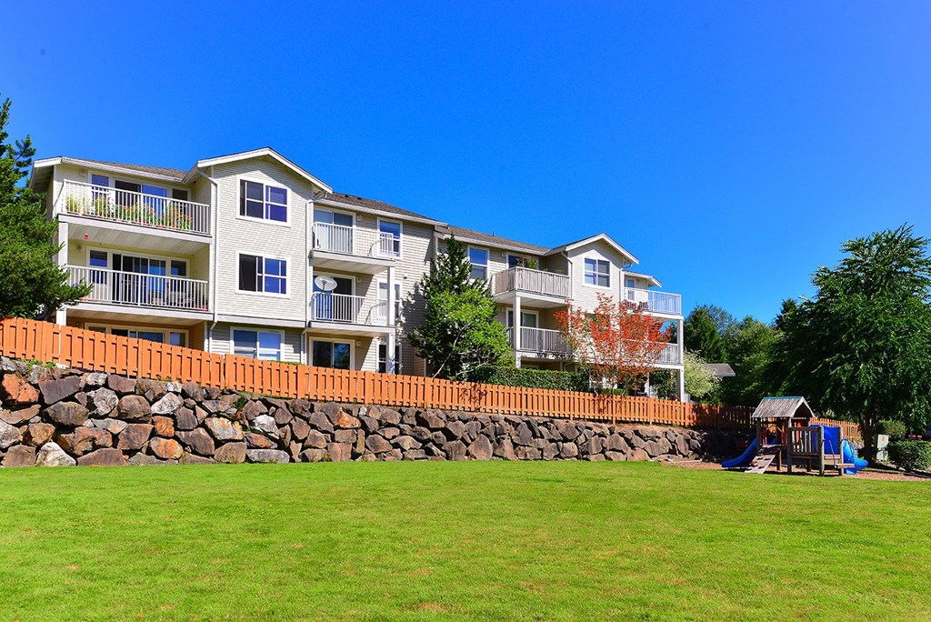 One-Bedroom Apartments in Issaquah, WA - Private Park with a Small Play Area and Manicured Lawn