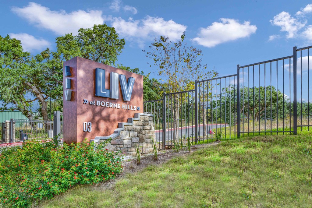 the sign for the linkedin building in front of a fence