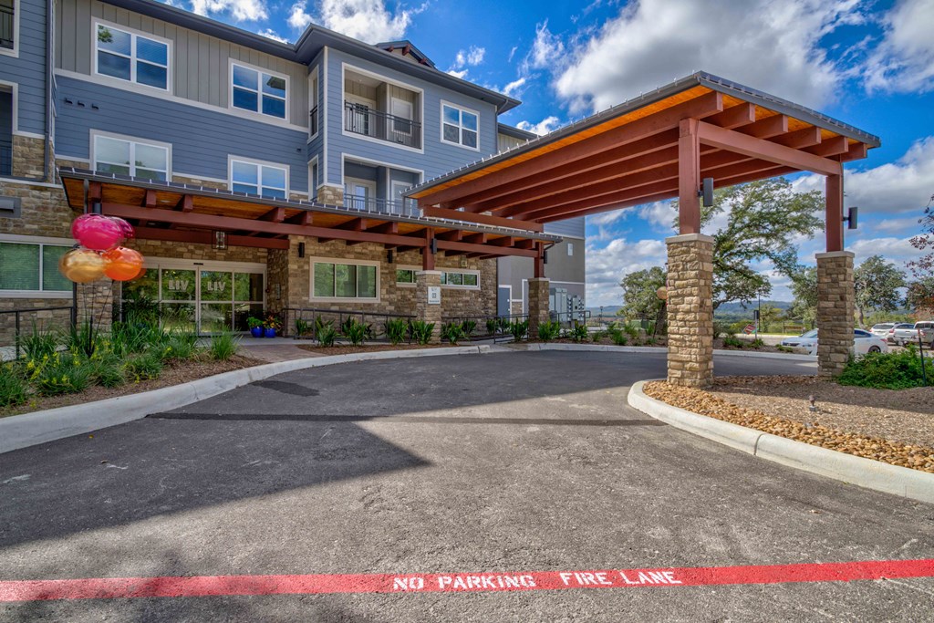 the entrance to a building with a no parking sign
