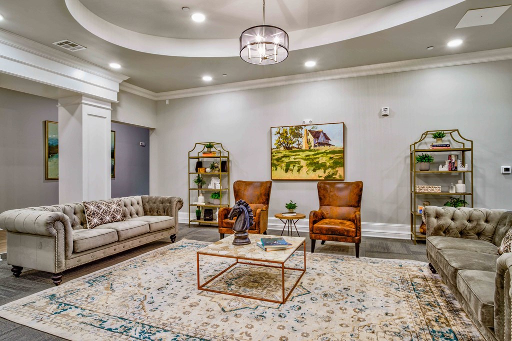 a living room with couches and chairs and a rug at LIV at Boerne Hills an Active Senior Community 62+, Texas, 78006