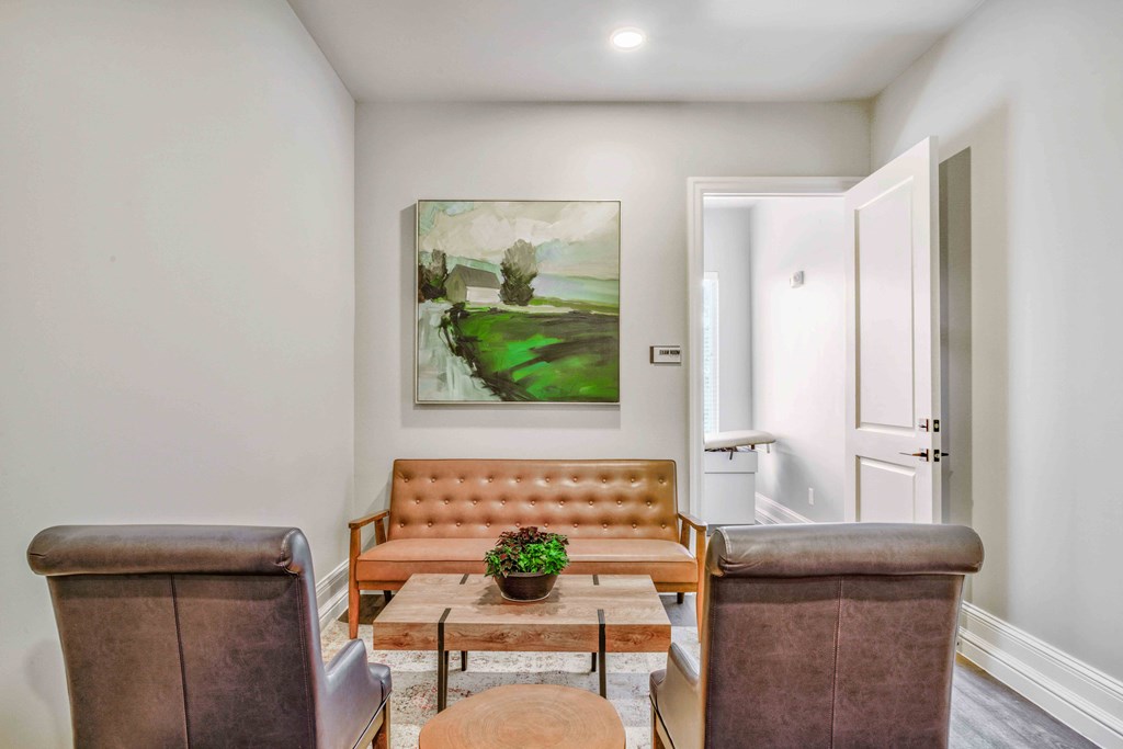 a living room with a couch and a table at LIV at Boerne Hills an Active Senior Community 62+, Boerne