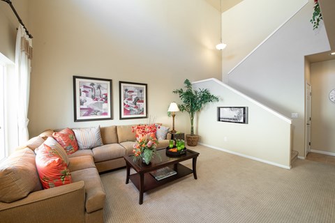 a living room with a couch and a coffee table