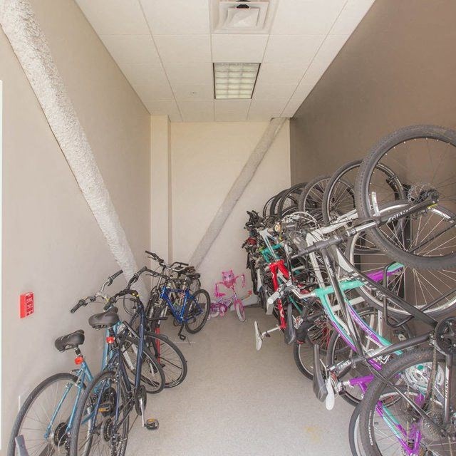 a room filled with lots of bikes sitting next to each other