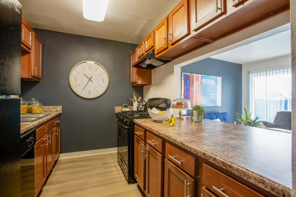 Spacious kitchen with plenty of cabinet storage at Midtown on Seneca, a pet-friendly apartment community near East Central Tucson, Tucson, AZ.