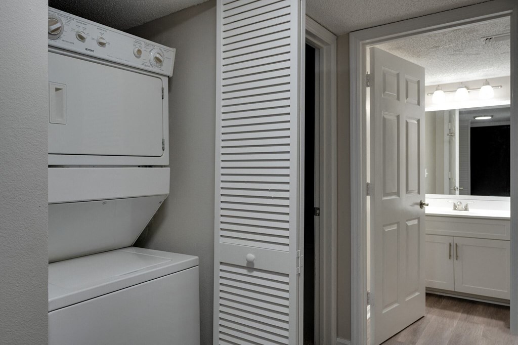 Oasis of Mandarin Apartments in Jacksonville, FL photo of  washer and dryer in storage closet
