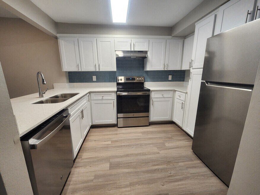 Oasis of Mandarin Apartments in Jacksonville, FL photo of luxurious gourmet kitchen with stainless steel appliances