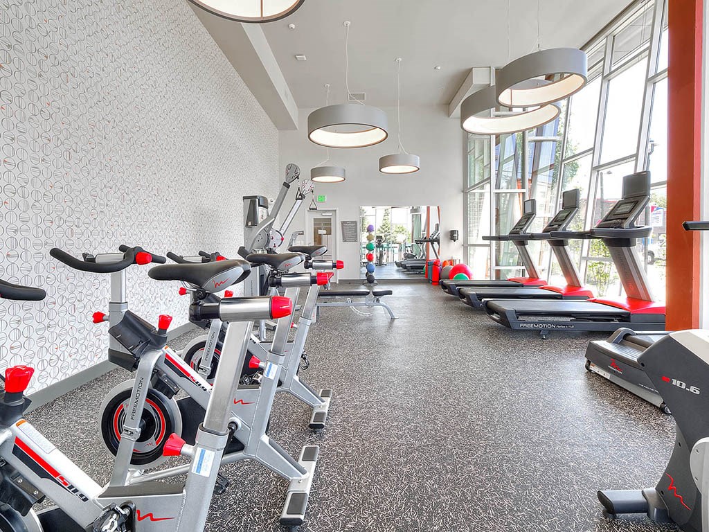 Fully equipped 24 hour fitness center at Astro Apartments, Seattle, Washington