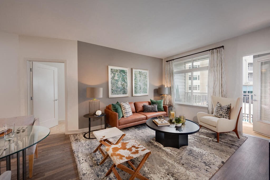 a living room with a couch and a table